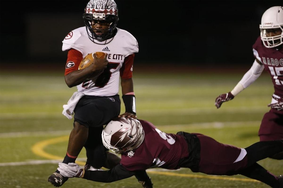 Belleville West’s Jack Lanxon tackles Granite City’s Freddie Edwards during the first half of their SWC football game earlier this school year. The two schools will not be conference rivals after the conclusion of next school year.