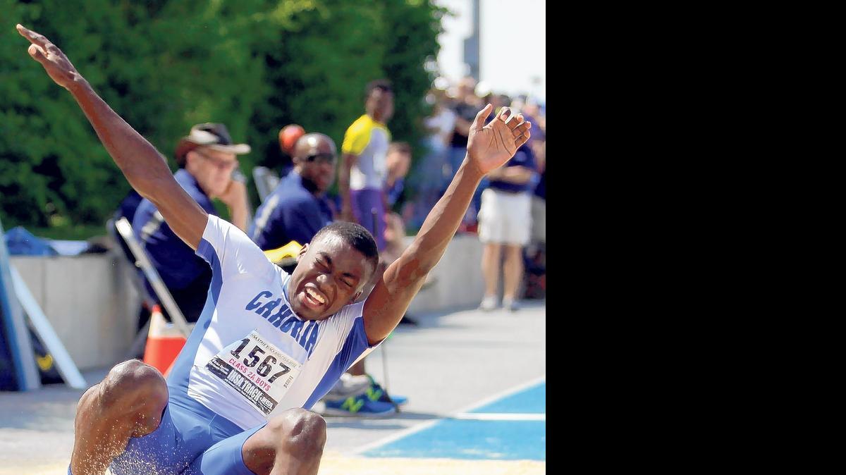 
Cahokia's Ja’Mari Ward competes at the 2014 IHSA boys state track and field meet in Charleston. On Friday in Charleston, Ward broke the state record in the long jump with a leap of 25-0 1/4. He also sits in first place in the triple jump, where his effort of 50-6 1/2 broke the Class 2A record. 
