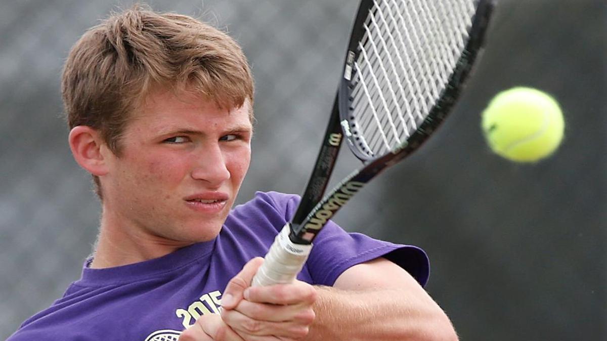 Mascoutah’s Andy Graf hits a backhand during practice at the school.