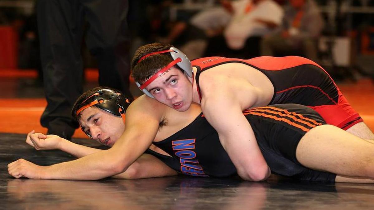 Triad’s Cole Witzig, shown in control during a match during the season, became the Knights’ first three-time all-state wrestler. Witzig is also the first Triad athlete to earn three straight Class 2A state medals and his 152 career wins and 47 pins also rank him among the best in school history.