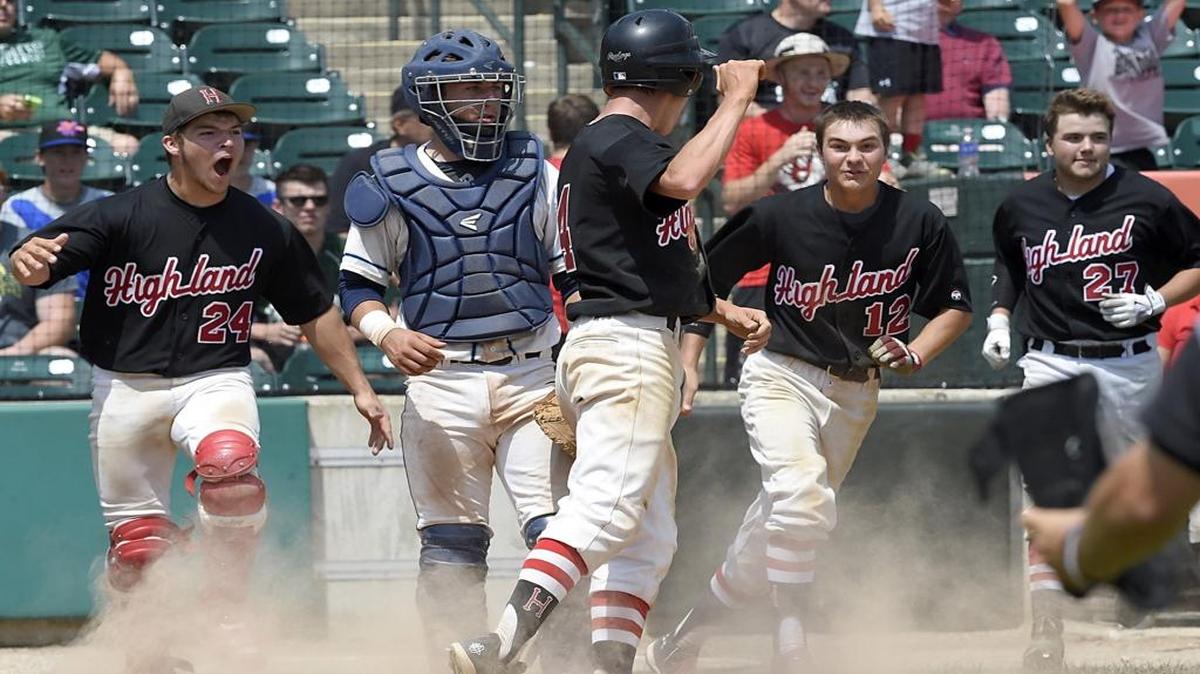 Highland’s Tyler Kimmle (4) jumps up after scoring the winning run in the bottom of the seventh inning in the state title game last season against Nazareth Academy.
