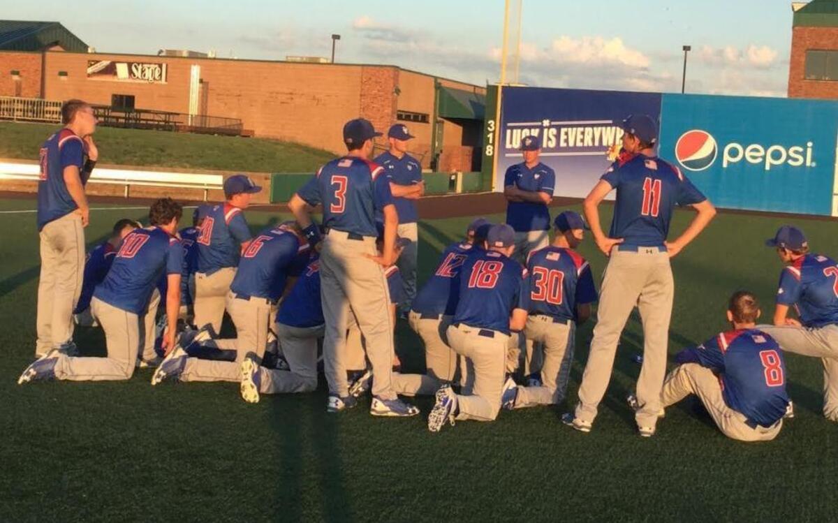 Nashville baseball coach Chad Malawy talks to his players after a Super-Sectional loss in 2017.