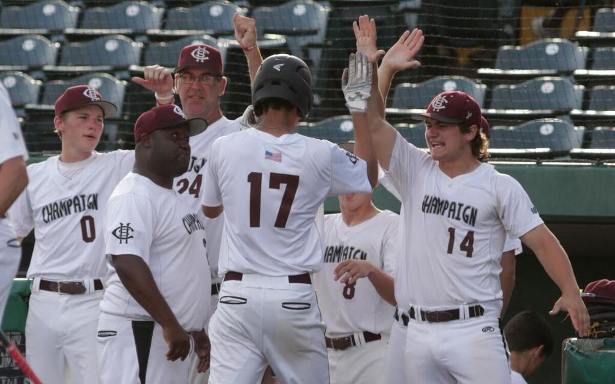 Champaign Central’s Cam Robinson celebrates with his teammates after he homers during their Supersectional against Mascoutah.