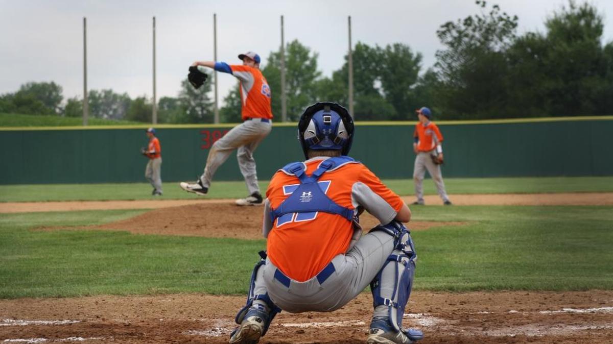 Okawville pitcher Brendan Killion throws to catcher Brad Fuhrhop
