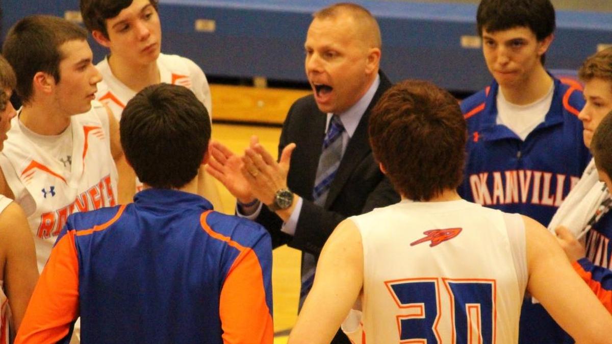 Okawville coach Jon Kraus (center) picked up his 300th career win on Friday against Columbia.