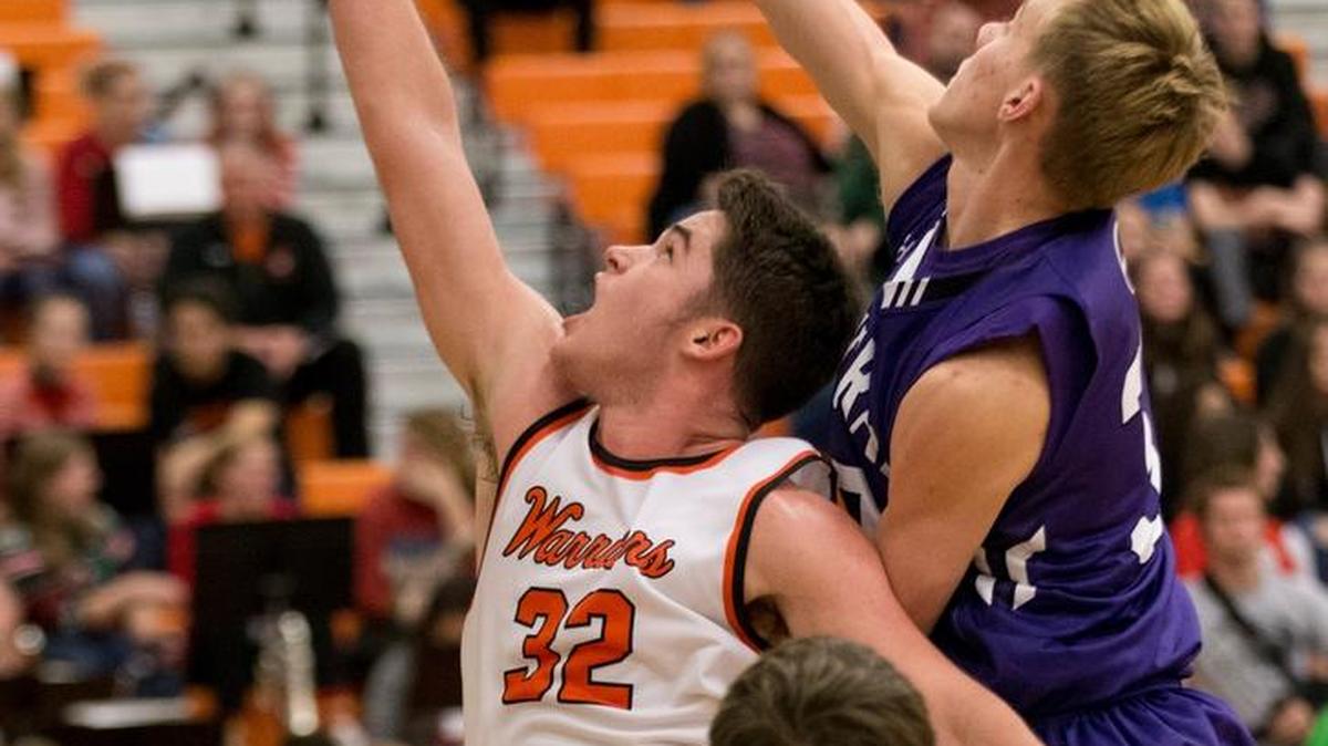 Wesclin’s Justin Kellogg goes to the basket during the Cahokia Conference basketball game with Central Friday.