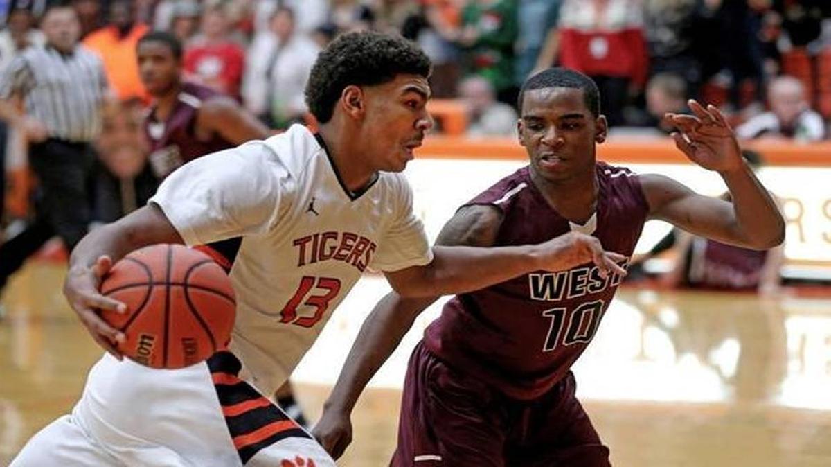 Edwardsville’s Mark Smith, No. 13, is the metro-east’s boys basketball leader in assists and free throw percentage. He also ranks third in scoring.