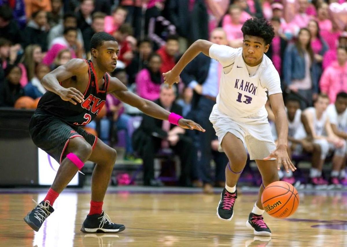 Collinsville’s Ray’Sean Taylor drives against Granite City’s Justin Wiley during their Southwest Conference game last season.