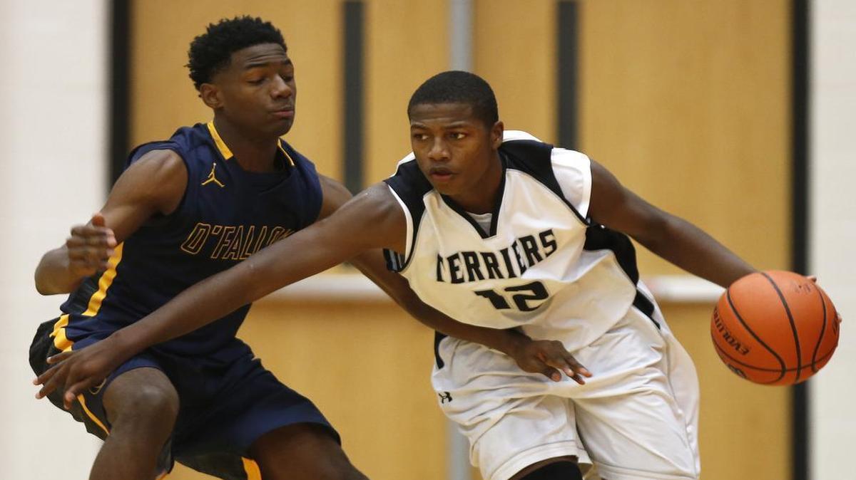 Carbondale's Unree Westley drives past O'Fallon's Burke Watts during their game at the Battling Bulldogs Thanksgiving Tournament at Waterloo High School on Monday.