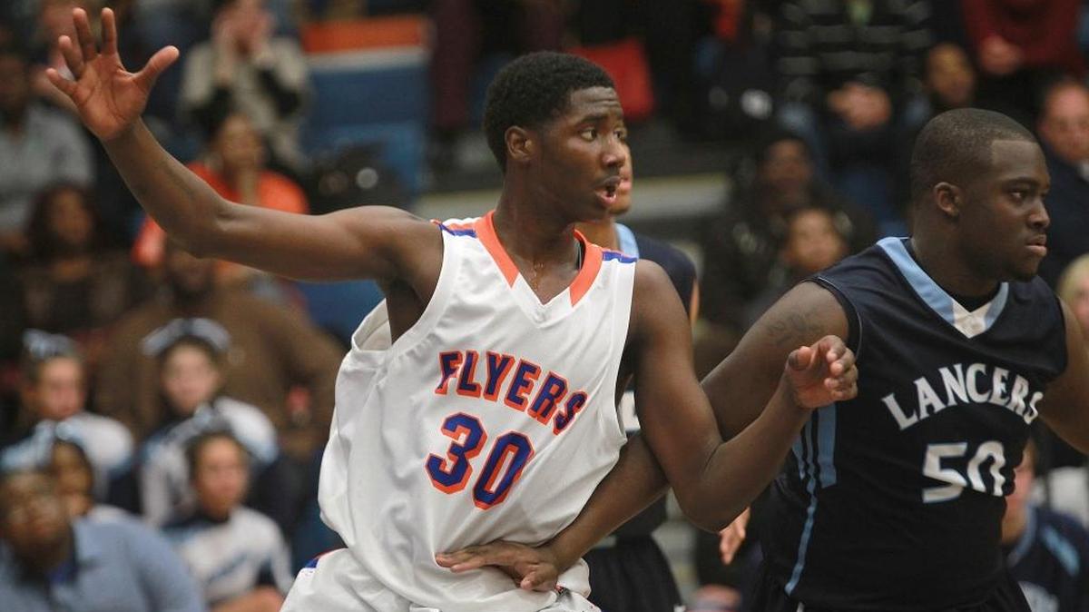 Former East St. Louis High standout Jeremiah Tilmon (30, left) has made a verbal commitment to the University of Illinois.