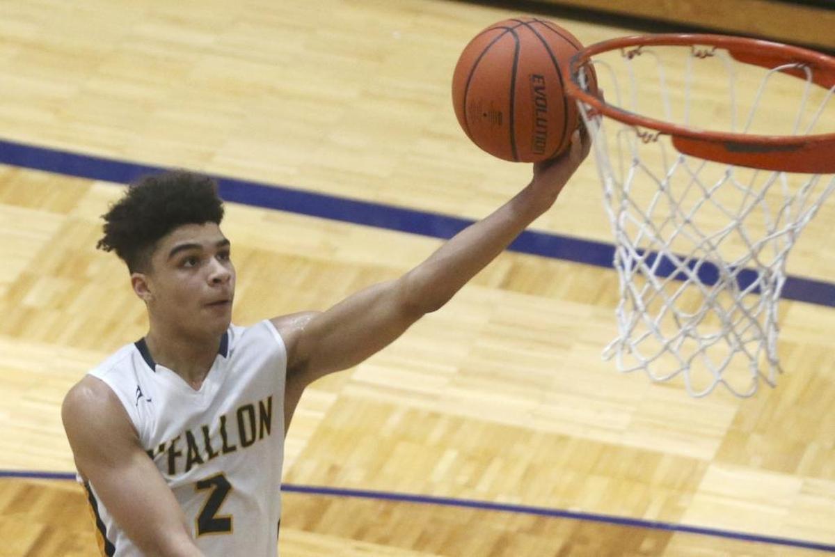 O'Fallon's Jalen Hodge puts up a shot against East St. Louis last season.