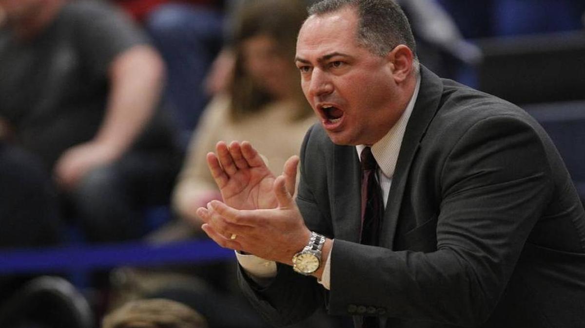 Belleville West head basketball coach Brian Muniz will go head-to-head with his brother Brian, when the Maroons take on the O’Fallon Panthers Tuesday. They are believed to be the first brothers to lead teams against each other in Southwestern Conference play.