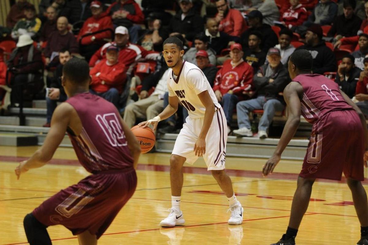 Belleville West junior guard Lawrence Brazil III (no. 10) was 6 for 6 from the field including three 3-point baskets to help the Maroons to a win over Collierville at the Centralia Holiday Tournament last years. Brazil and the Maroons go the tournament repeat this week.