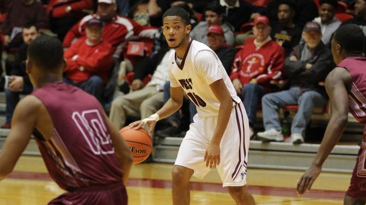 Belleville West junior guard Lawrence Brazil III (no. 10) was 6 for 6 from the field including three 3-point baskets to help the Maroons to a win over Collierville at the Centralia Holiday Tournament last years. Brazil and the Maroons go the tournament repeat this week.