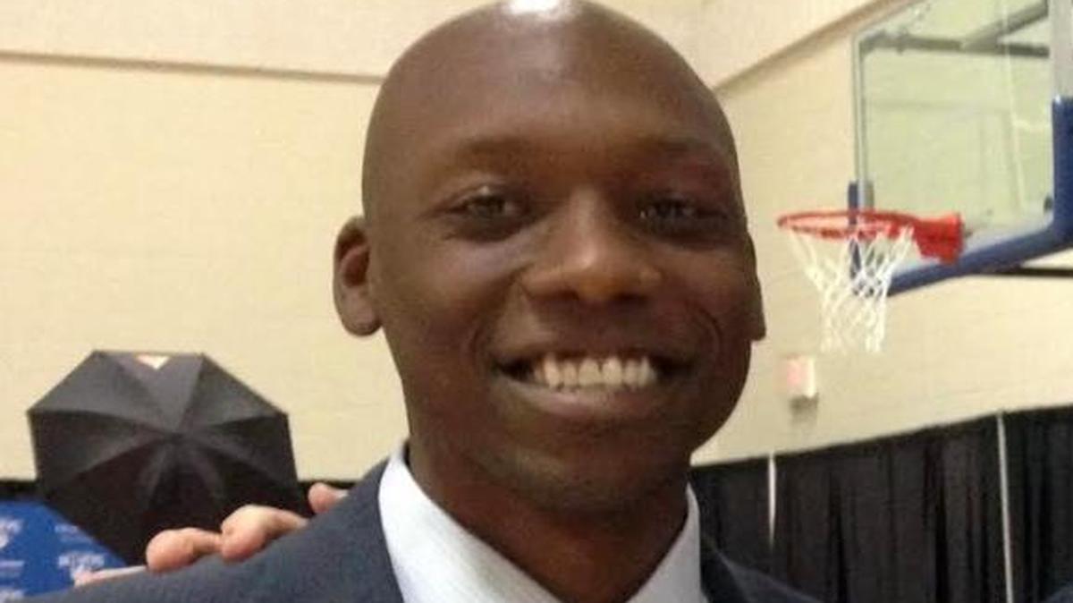 Justin Love (left), here with ESPN analyst Seth Greenberg, has been hired as the new boys basketball coach at Mascoutah High School.