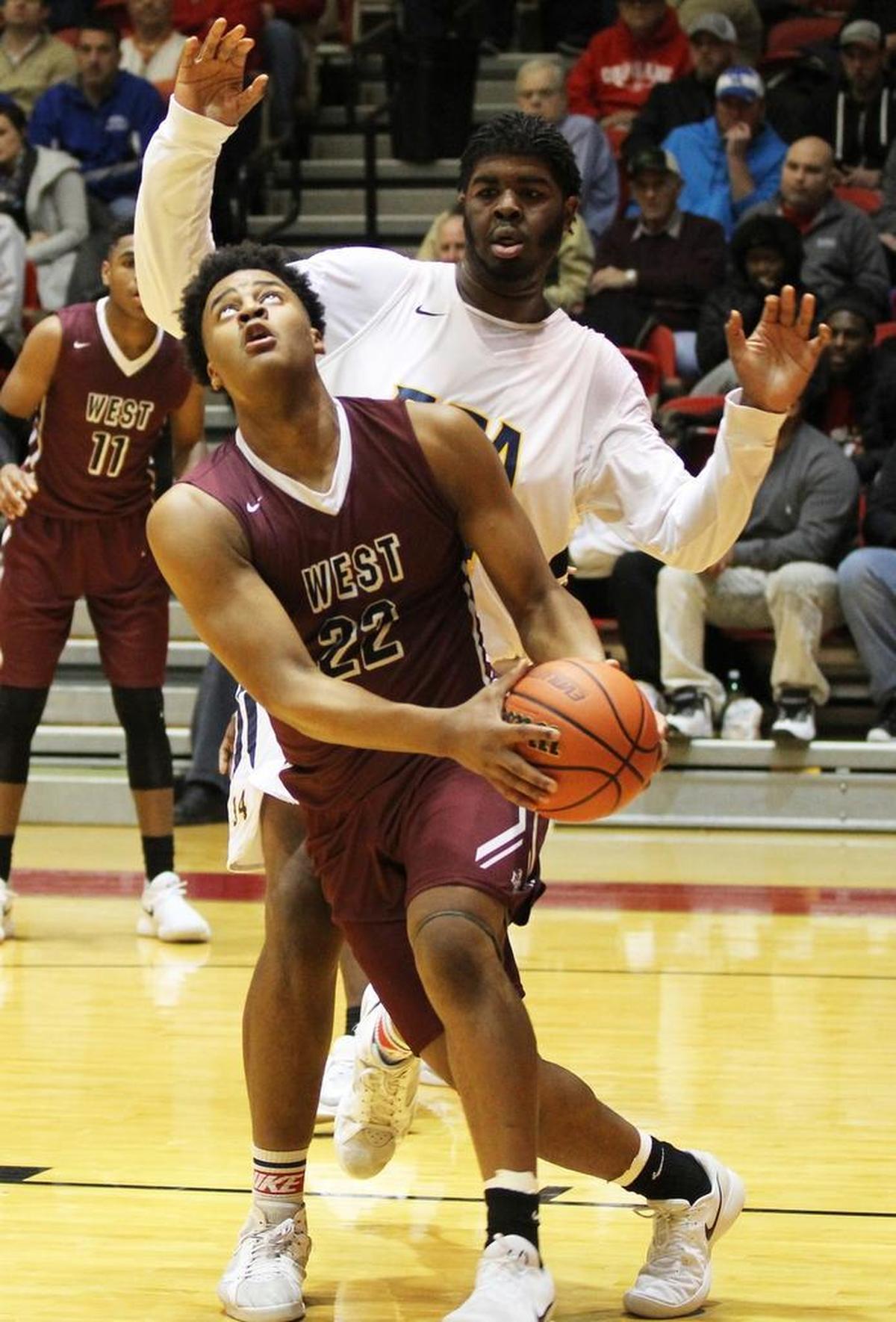 At 6-5, 242 pounds, Keith Randoph is a physical presence under the goal for Belleville West.