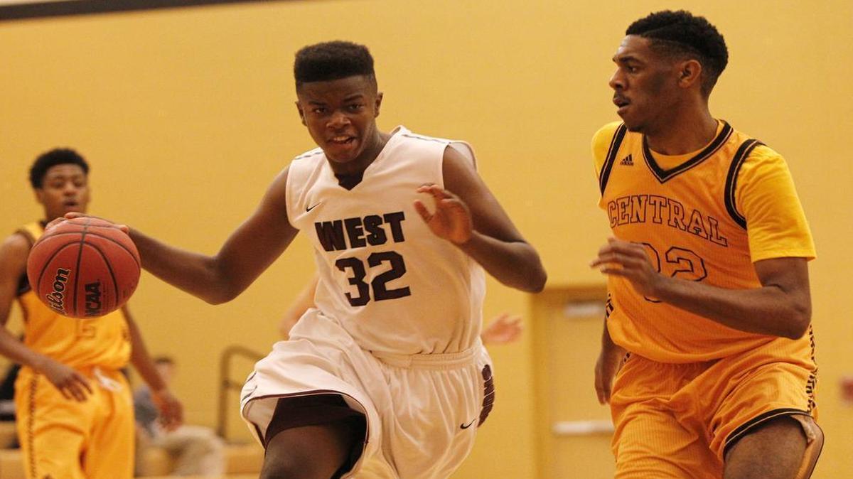 Belleville West's EJ Liddell drives past Hazelwood Central's Dominique Dobbs during their game at the Vianney Invitational Tournament on Wednesday.