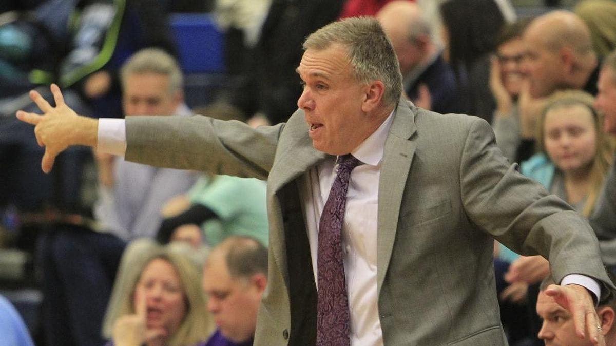 Colllinsville head coach Darin Lee gestures as he shouts in tactics to his team in a 2016 game.