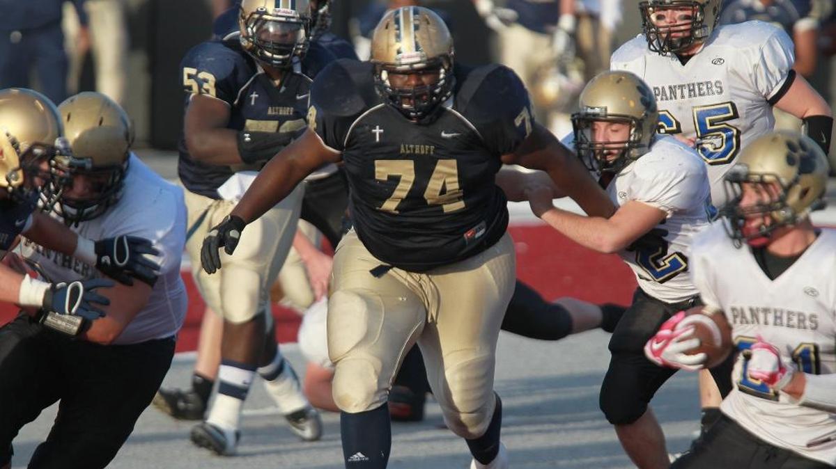 Former Althoff all-state defensive lineman Merrick Jackson (74) during his senior year in 2012. The junior-college All-American has signed with Minnesota.