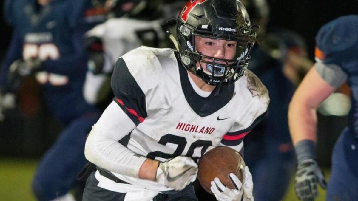 Highland’s Brady Feldmann carries the ball in a game earlier this season. He amassed 126 yards on 15 carries in a rivalry win over Triad Friday.
