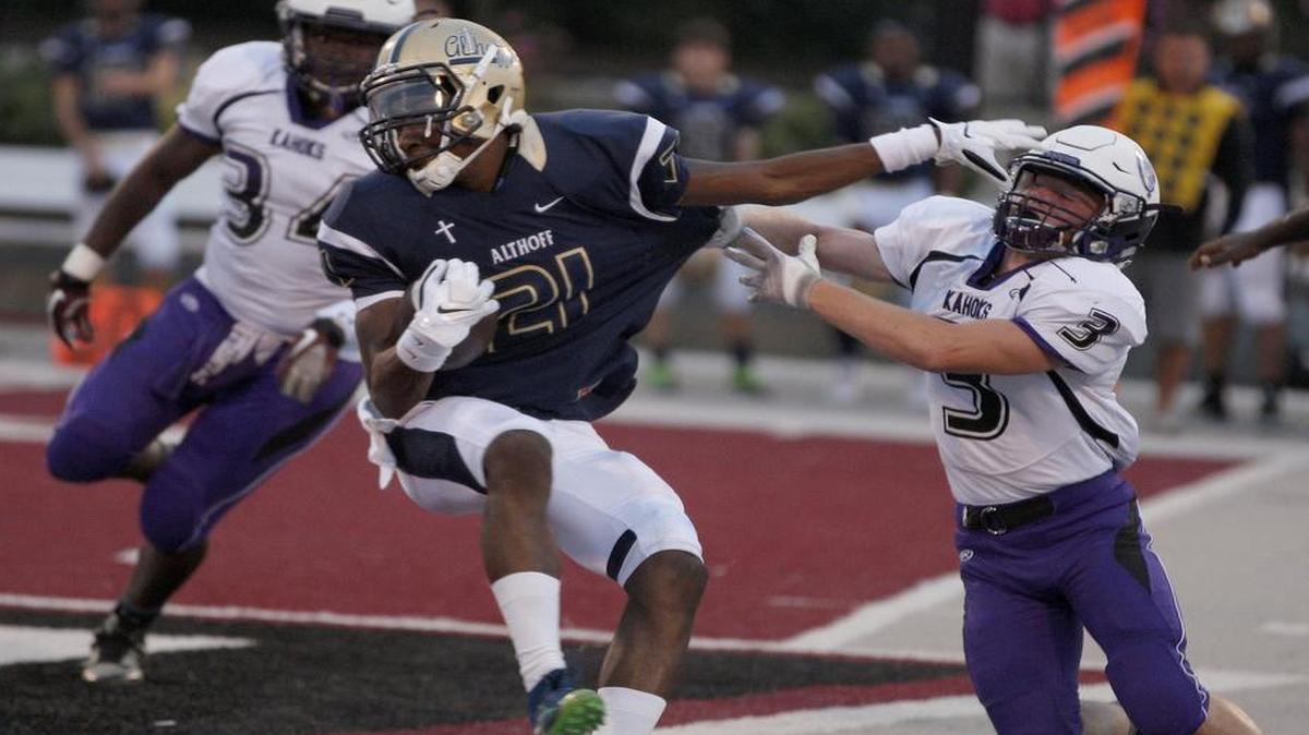 
Althoff’s CJ Coldon trys to make it to the end zone.
