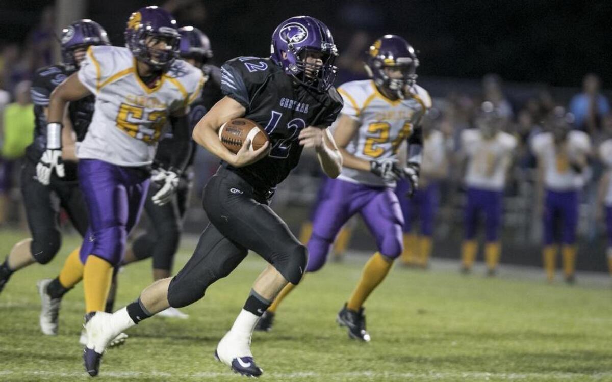 Breese Central’s Tyson Lobb makes a touchdown run during the first half against Carlyle. The unbeaten Cougars next take on cross-town Mater Dei in the annual Milk Bowl rivalry game Friday.