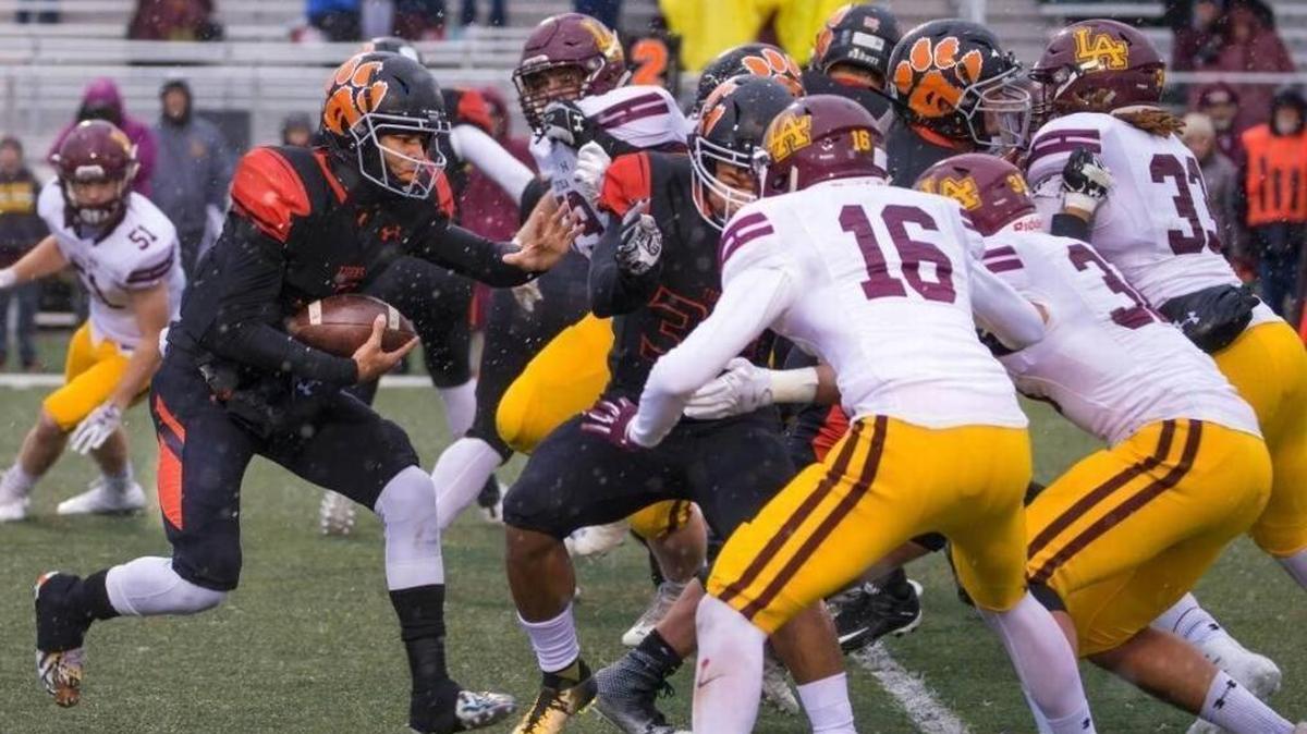 Edwardsville junior quarterback Kendall Abdur-Rahman (left), who powered the Tigers to the semifinals of the Class 8A playoffs, has received a scholarship offer from Illinois. Abdur-Rahman previously received offers from Iowa State and Iowa.