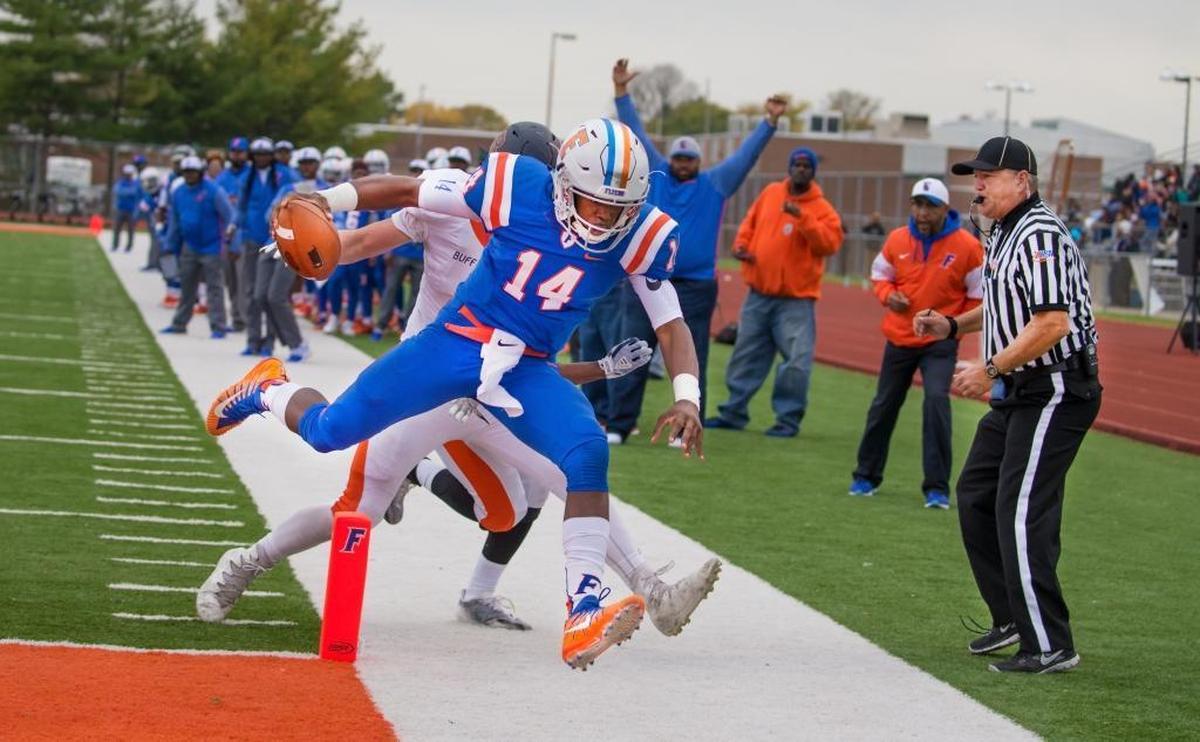 East St. Louis’ Eric Johnson runs in for the touchdown in the third quarter against Buffalo Grove during Saturday’s second-round playoff game at Clyde Jordan Stadium.