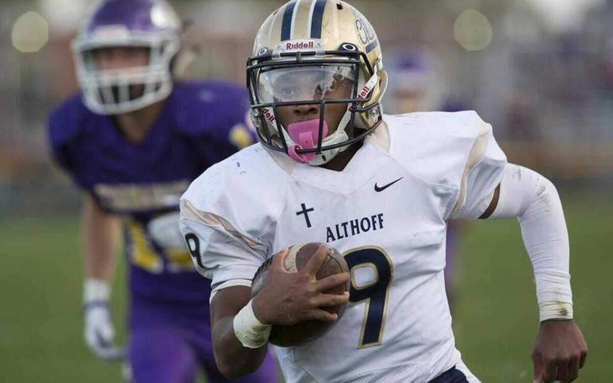 Althoff senior running back Jaylon Bester, shown here against Taylorville in the second round win, has 1,979 yards rushing and 28 touchdowns this season for the Crusaders.