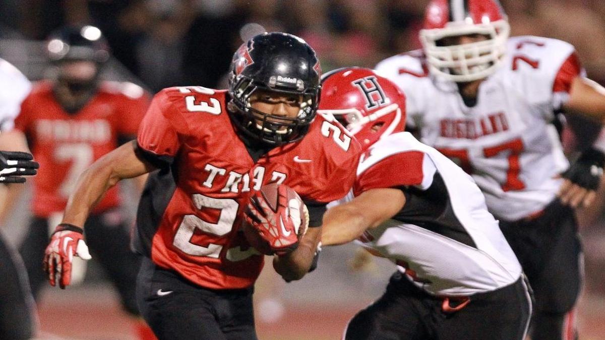 Adam Nelson is Triad’s all-time leading rusher for a single season and a career. He is the Belleville News-Democrat’s co-player of the year.