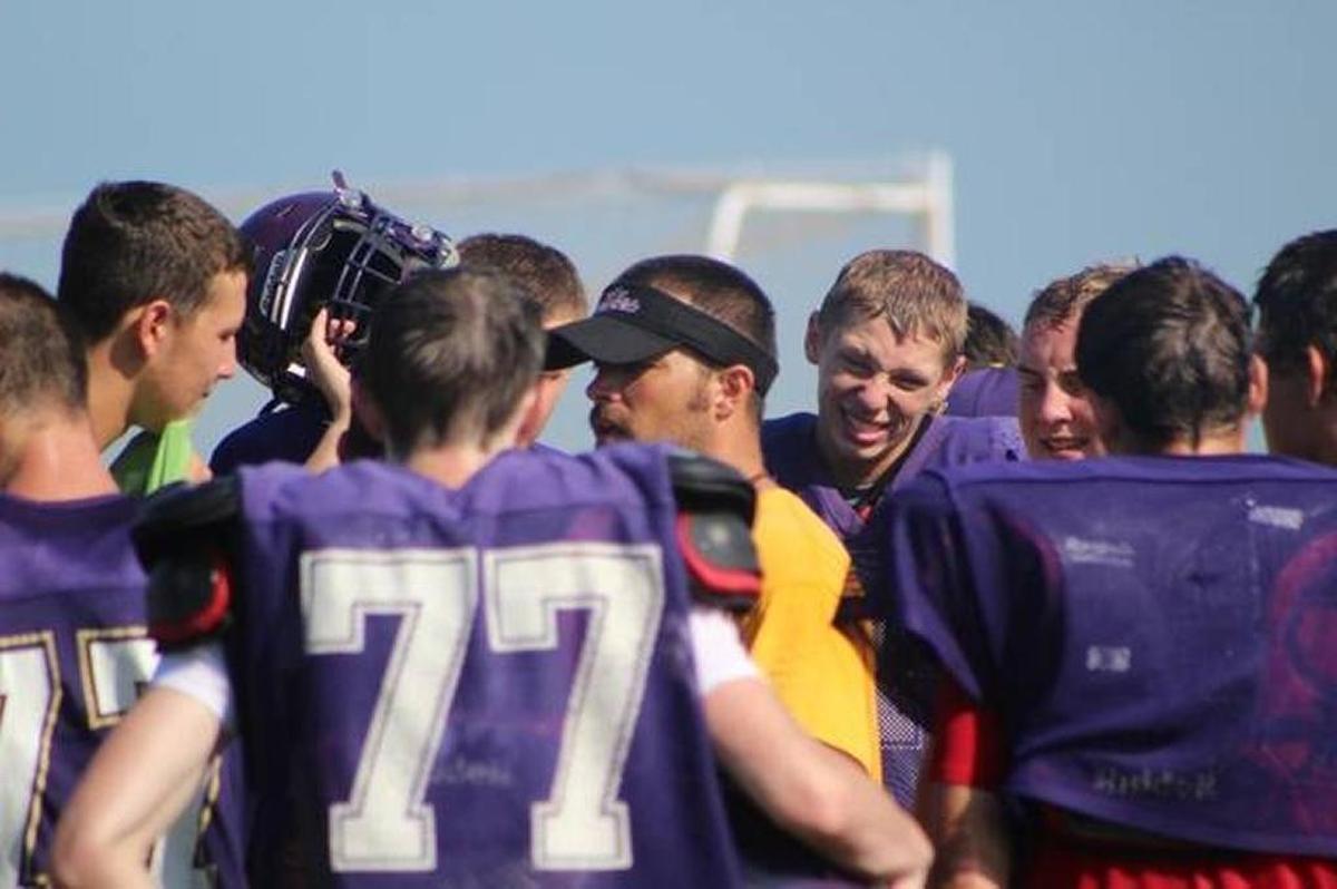 Carlyle coach Chris Birkner rallies his team during the first week of practice.