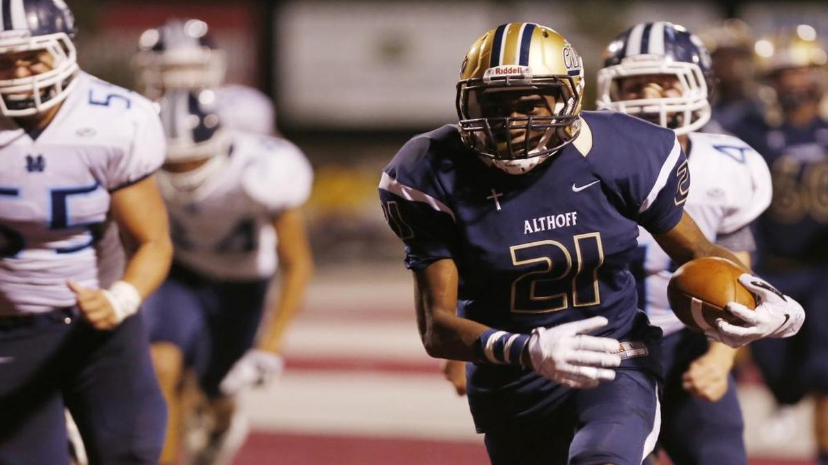 Althoff High graduate CJ Coldon carries the ball during a game in 2016. Coldon, who played the 2022 season at Oklahoma, now has his sights set on the NFL draft.