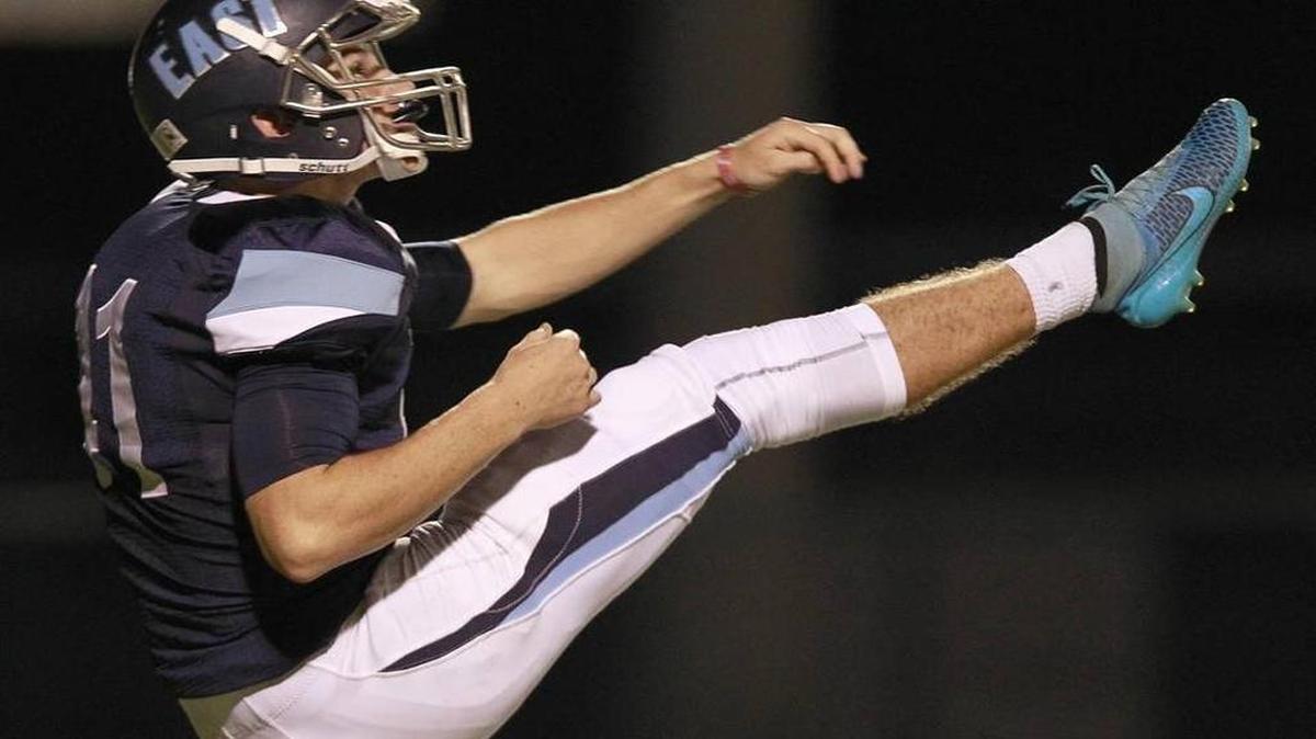 Belleville East kicker Matt Sotiropoulos watches a punt in the Lancers’ game Sept. 18. Tim Vizer tvizer@bnd.com