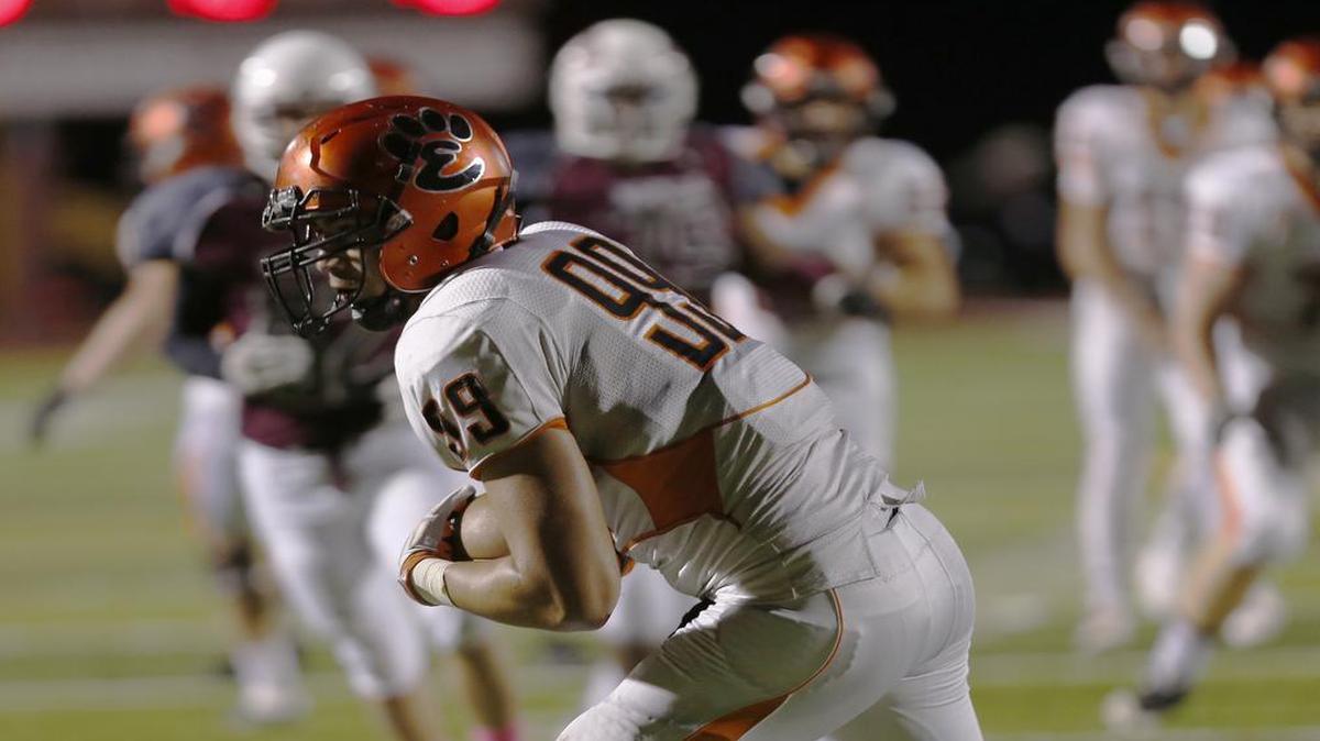 
Edwardsville’s A.J. Epenesa scores a touchdown during the first half of Friday’s game against the Maroons at Belleville West. See a gallery of photographs from the game at bnd.com.
