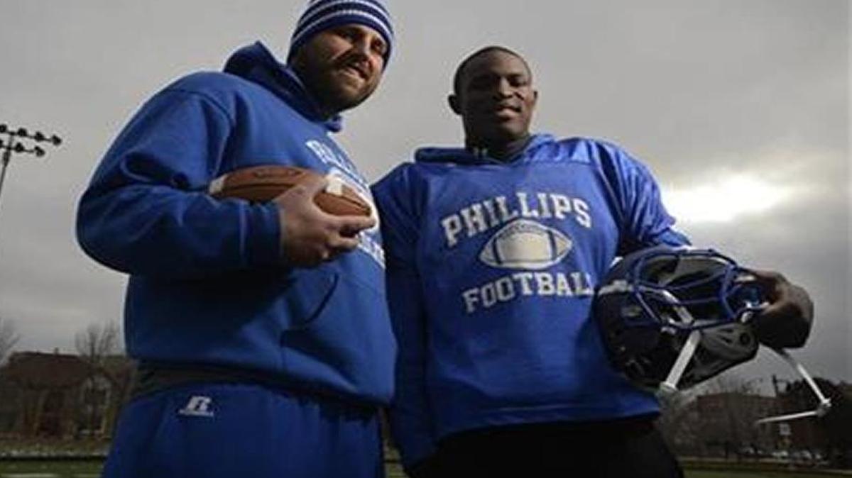 Mascoutah High graduate and Phillips defensive coordinator Michael Larson (left) with former Phillips star Jamal Brown
