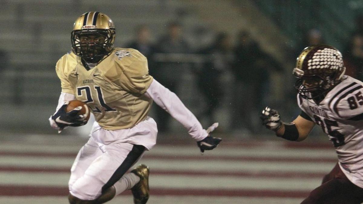 C.J. Coldon (21) is the Althoff Crusaders’ first 1,000-yard receiver.