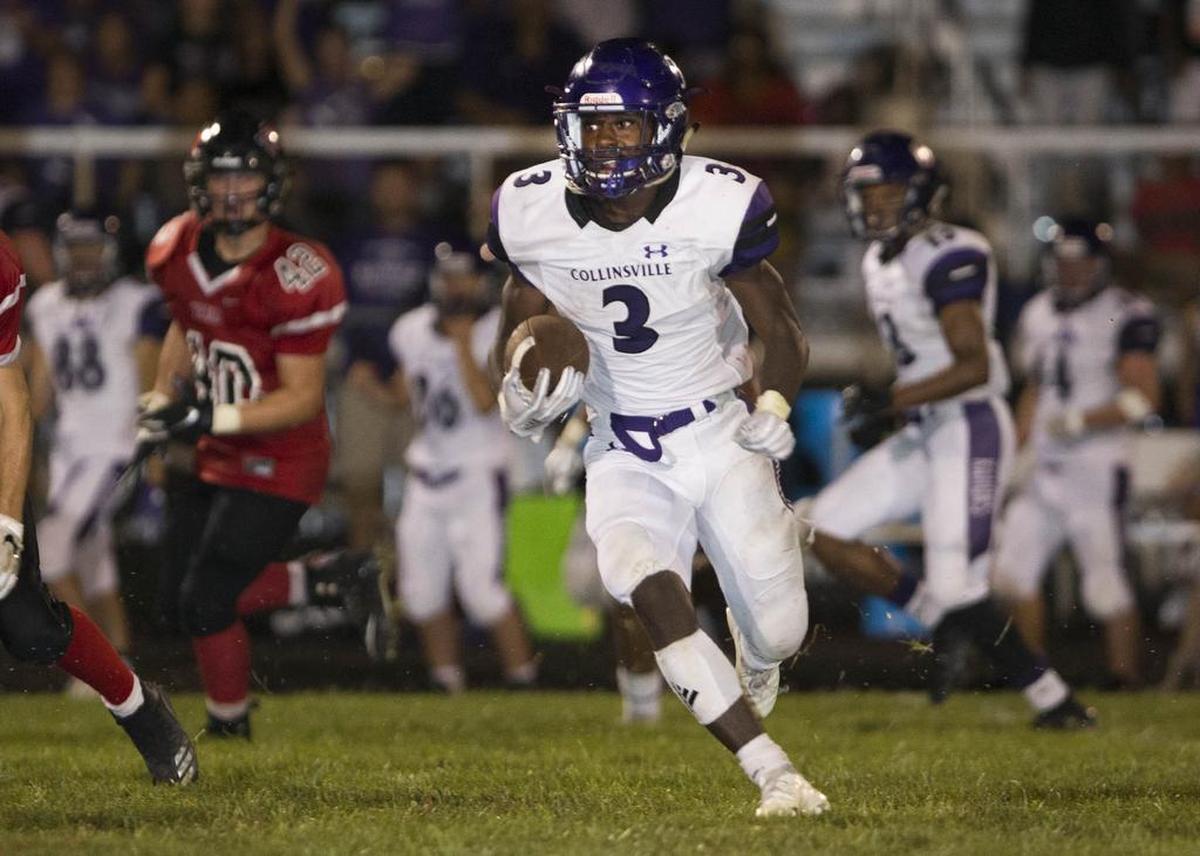 August 31, 2018 - Troy, IL - CollinsvilleÕs Kameron Sloan carries the ball during the Collinsville - Triad Varsity football game Friday night in Troy. [Photo: Chris Johns]