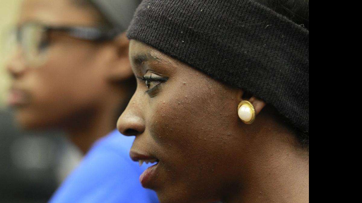 
Mariya Hudson speaks about her victories at the IHSA girls state track meet during an interview on May 27, 2015. Behind her is teammate Raynesha Lewis, also a big winner at state.
