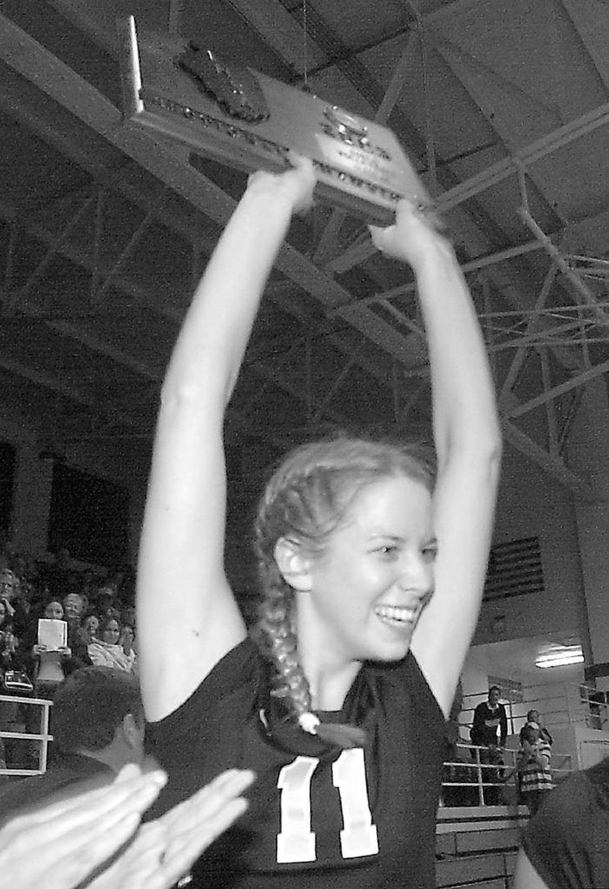 Sara Thomas celebrates an Althoff championship win in 2003.