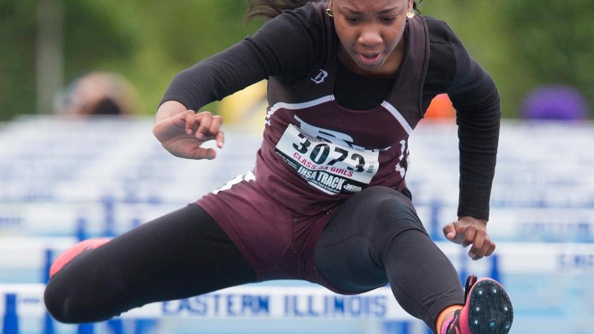 Belleville West’s Kelvi Searcy competes in the Class 2A 110-meter high hurdles preliminary competition at the track and field state finals.