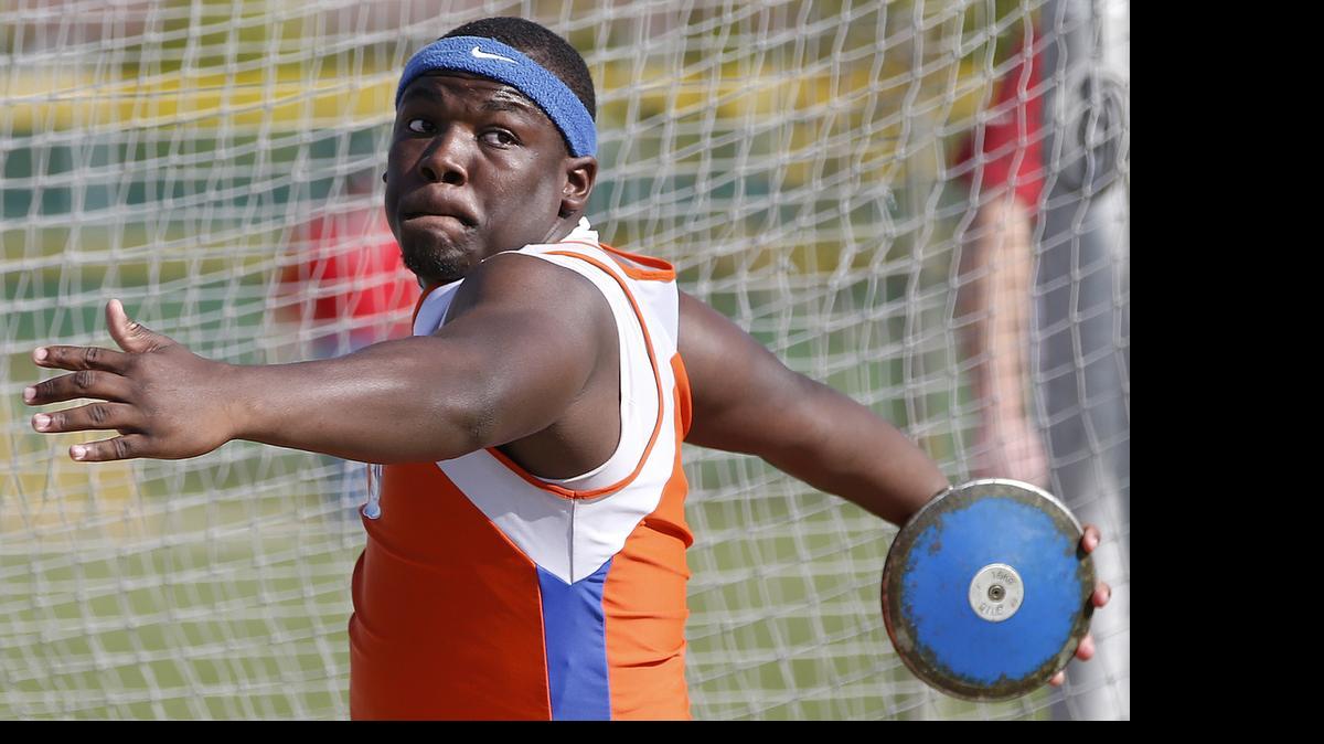 
East St. Louis’ LC Washington competes in the discus at Tuesday’s St. Clair County track meet at Belleville West. See more photographs of the meet at bnd.com.
