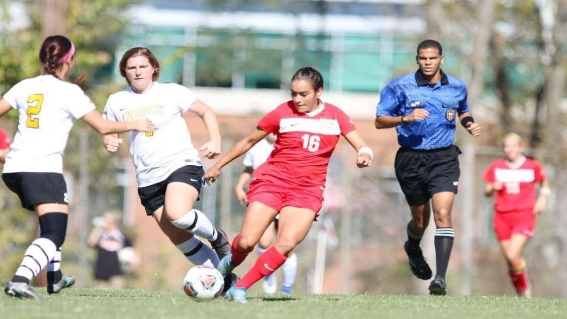 O’Fallon High graduate Kirsten Crabtree (middle), shown playing for Missouri-St. Louis last fall, has signed to play professionally in Sweden.