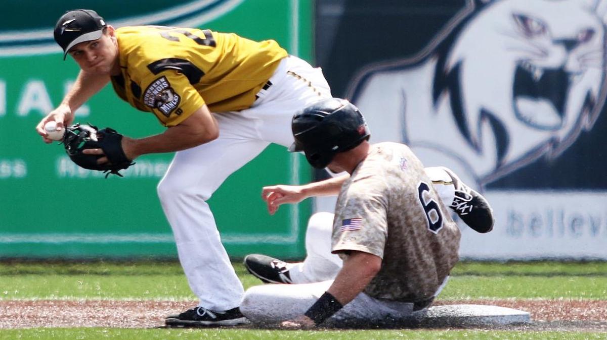 The Grizzlies’ Carter Burgess slides into second base and breaks up the double play as Miners second baseman Shane Kennedy makes the throw to first base. Southern Illinois won the exhibition game 7-5 over Gateway.