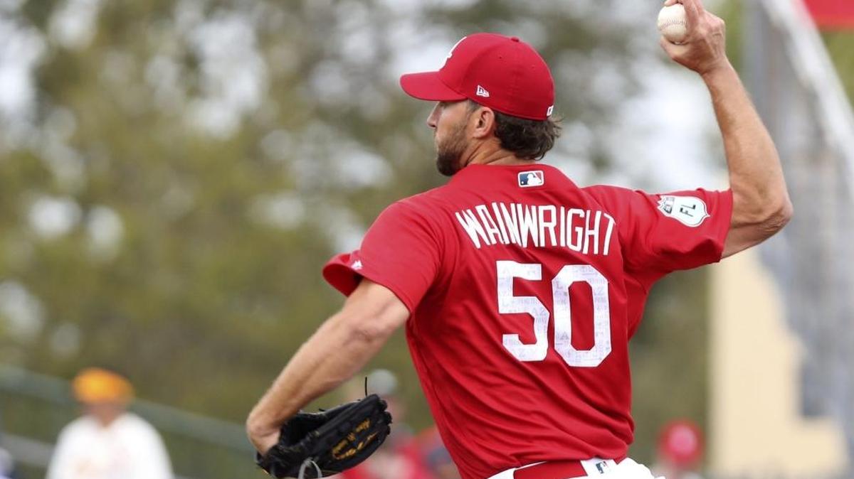 St. Louis Cardinals pitcher Adam Wainwright throws against the Marlins during a Spring Training game.