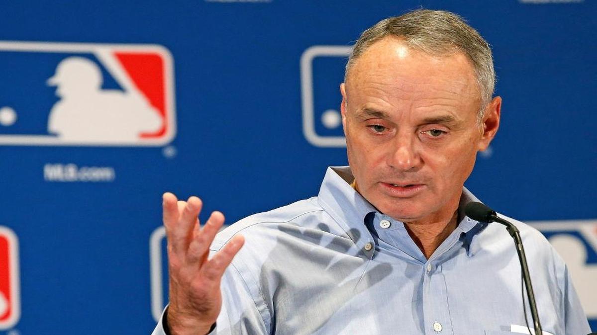 Baseball Commissioner Rob Manfred fined the St. Louis Cardinals $2 million and took away two draft picks as punishment for the hacking scandal.