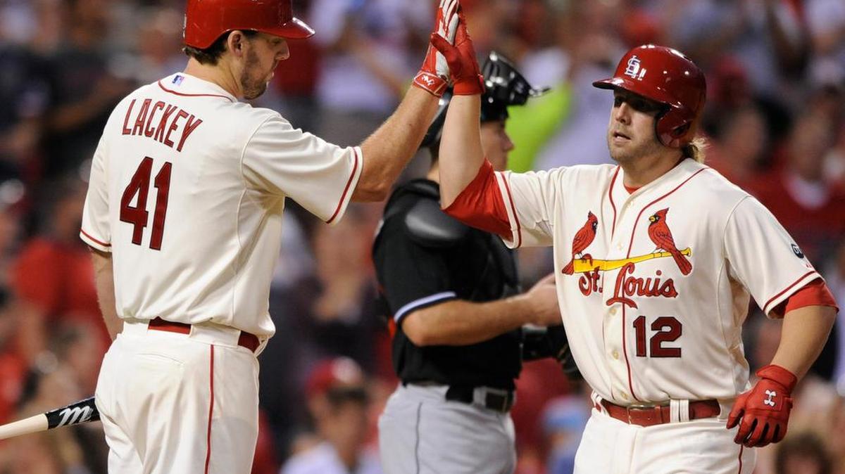 
The Cardinals’ Mark Reynolds is congratulated by John Lackey after hitting a three-run home run against the Marlins during the sixth inning Saturday at Busch Stadium. The Cardinals won 6-2.

