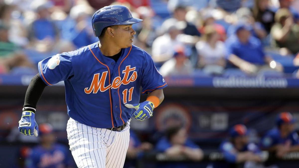 Ruben Tejada, seening watching his two-run home run against the St. Louis Cardinals on March 10, is now a Cardinal after being cut by the New York Mets.