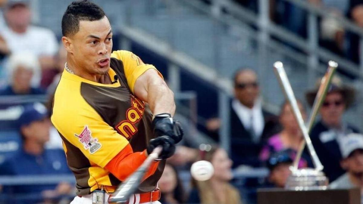 Giancarlo Stanton led the majors in home runs and RBIs in 2017 and was voted the National League’s MVP.