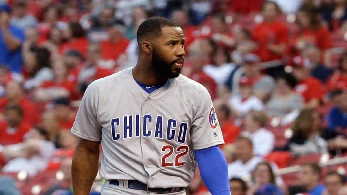 Chicago Cubs' Jason Heyward removes his helmet and looks around before stepping into the batters' box during the first inning of a baseball game against the St. Louis Cardinals on Monday, April 18, 2016, in St. Louis.