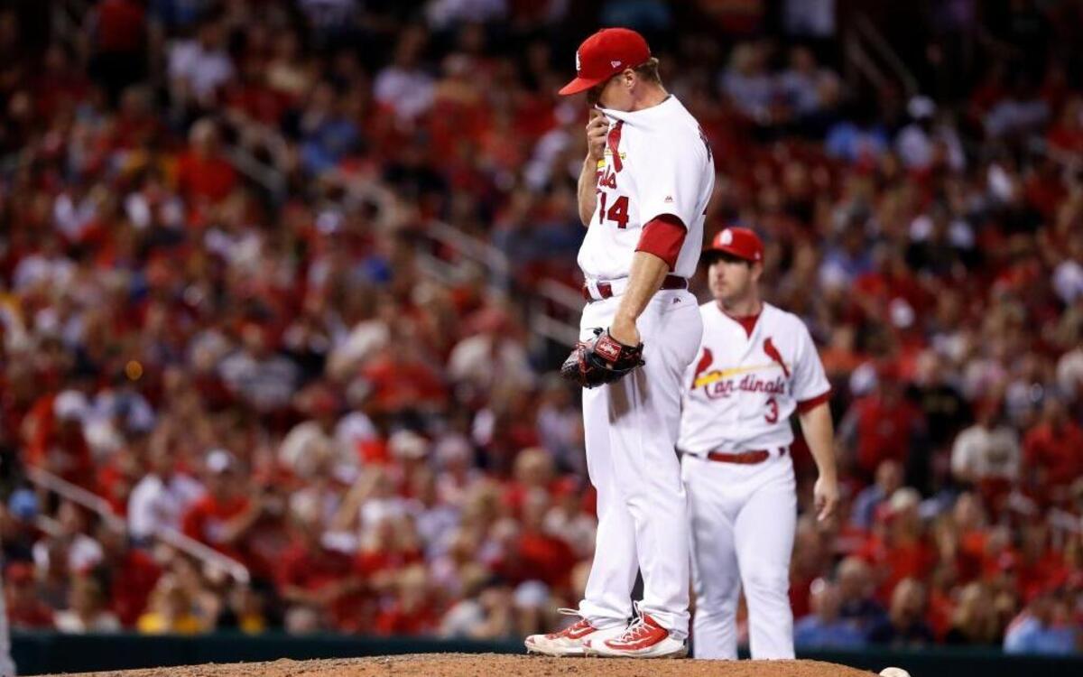 St. Louis Cardinals relief pitcher Trevor Rosenthal pauses after giving up an RBI single to Pittsburgh Pirates’ David Freese during the eighth inning of a baseball game Friday, June 23, 2017, in St. Louis.